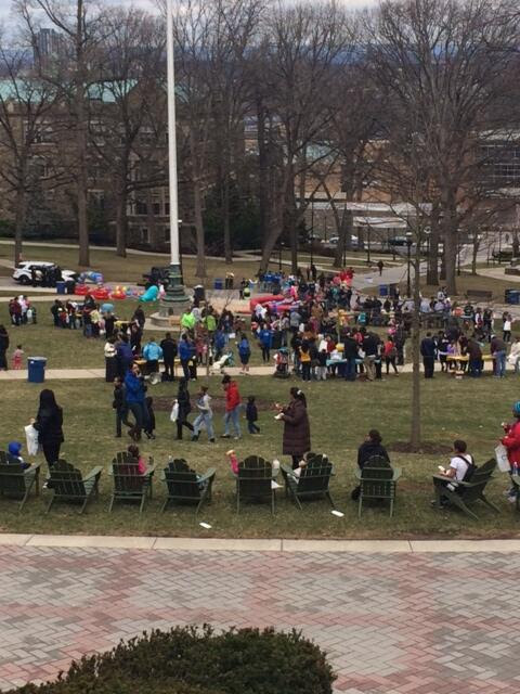 photo of people milling around on lower campus